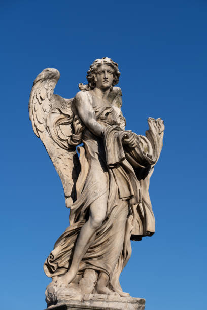 istock Angel with the Garment and Dice Statue 1288605760