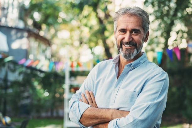istock Mature man on a garden party 1288610556