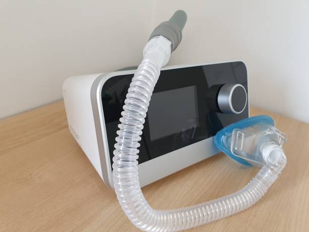 istock Cpap breathing machine sleep apnue 1288612041