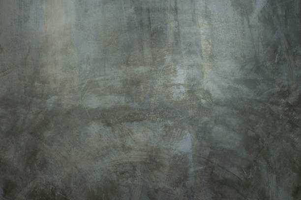istock Concrete gray grunge wall. old abstract texture as a retro pattern texture of old dirty cement color grey wall for background. 1288613360