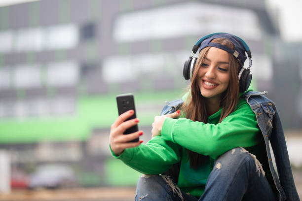 istock Beautiful girl taking selfie 1288613455