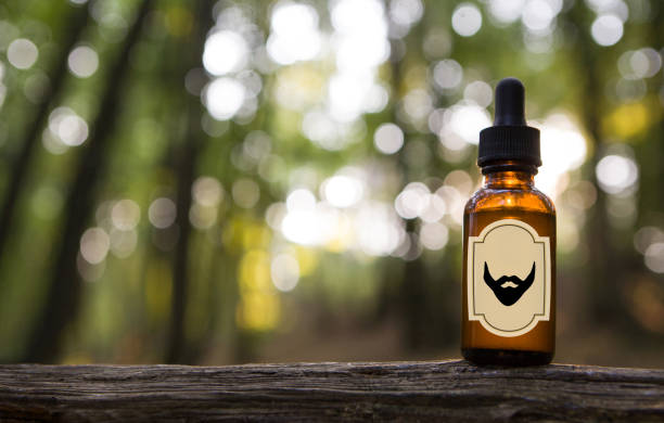 Natural beard oil, brown bottle. MOCKUP - copy space on bottle.