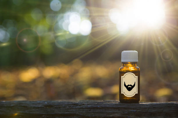 istock Bottle with herbal aromatic oil on a green background - MOCK UP. 1288614197
