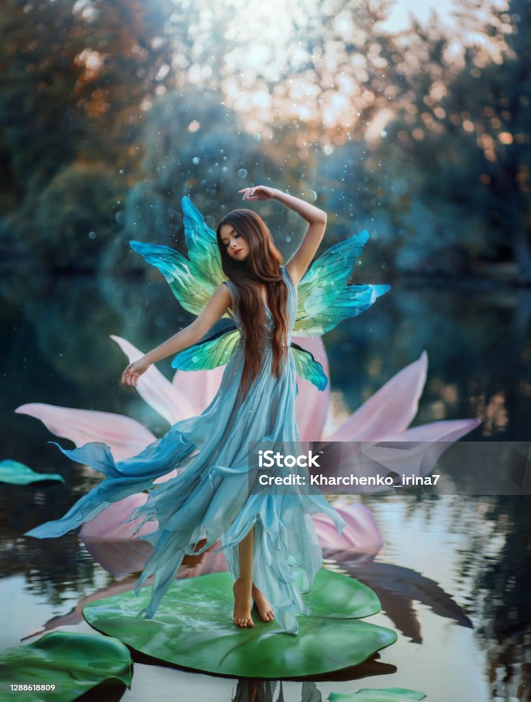 Beautiful Young Fantasy Woman In The Image Of A River Fairy Dances ...