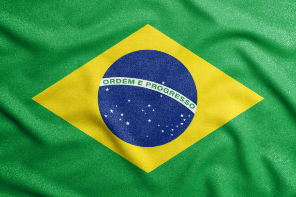 национальный флаг бразилии. главный символ независимой страны. - бразильский флаг стоковые фото и изображения