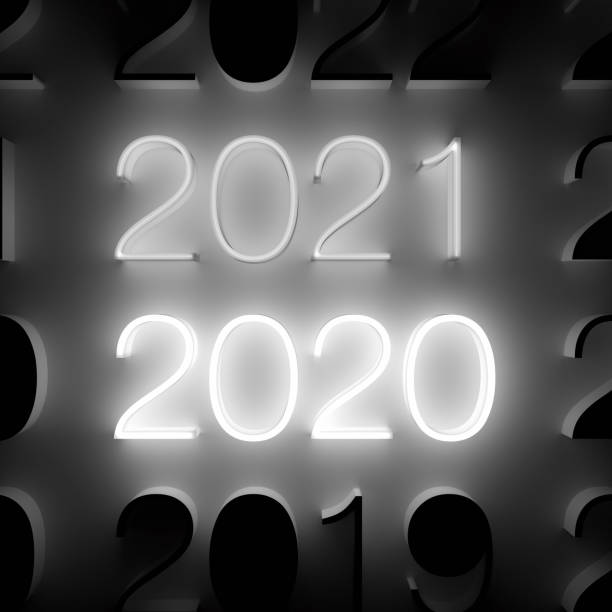 istock Luminous 2021 and 2020 number on wall. New Year concept 1288622998