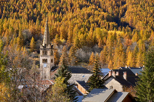 The village of Nevache with its church. Autumn in the Claree Valley. Hautes-Alpes, French Alps, France