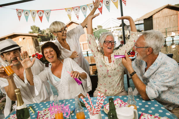 istock Senior people celebrating birthday 1288625107