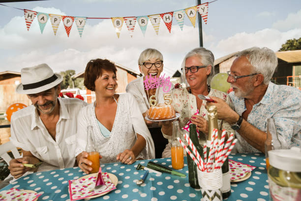 istock Senior people celebrating birthday 1288625246