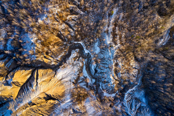 istock areal view sandy hills lakes rivers terrain old sand mines covered with first snow 1288628768