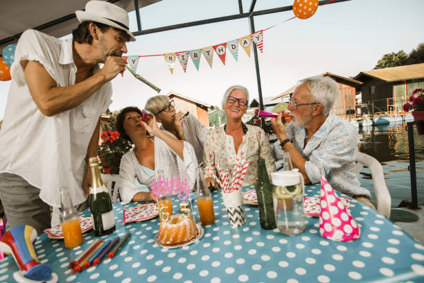 istock Senior people celebrating birthday 1288630752