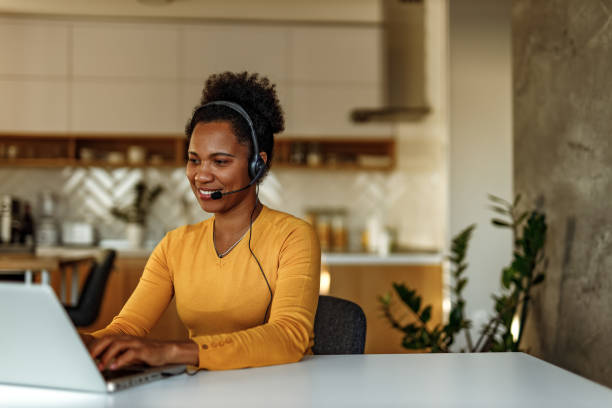istock Woman having video call, kitchen in the background. 1288632247