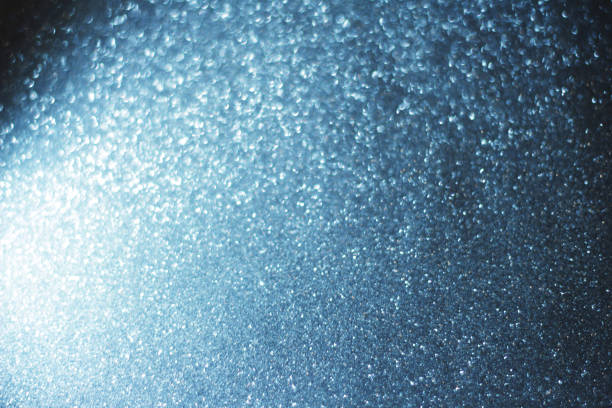 istock White and silver abstract bokeh lights. defocused background 1288632566