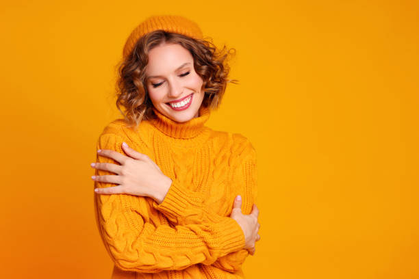 istock Happy female in warm sweater 1288636153