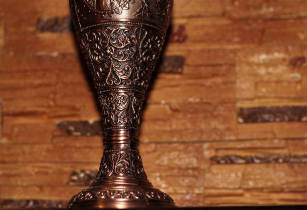istock copper vase with patterns on a background of stone 1288637882