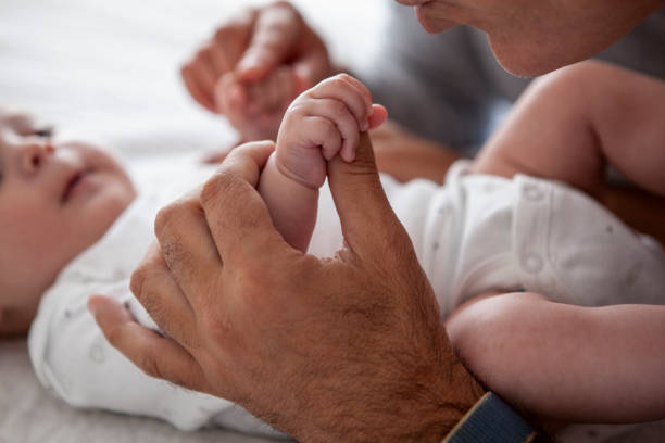 istock Couple playing with baby boy 1288640982