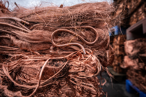 Crushed and baled copper wire for recycling in factory
