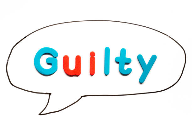 istock Alphabet letter with word guilty in black line hand drawing as bubble speech on white board background 1288643919