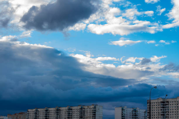 istock Sky. Thick and dark clouds together with the rays of the sun. 1288643932
