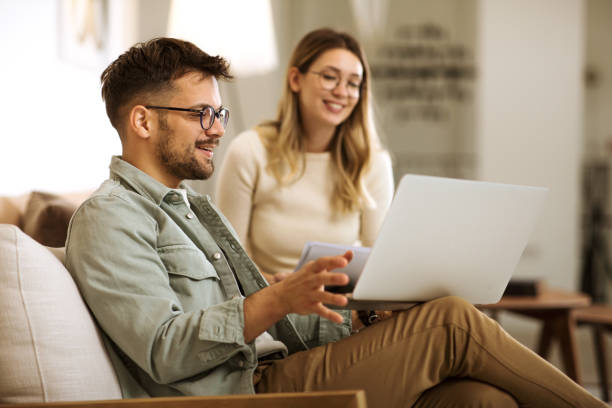 istock Young couple working from home 1288647150