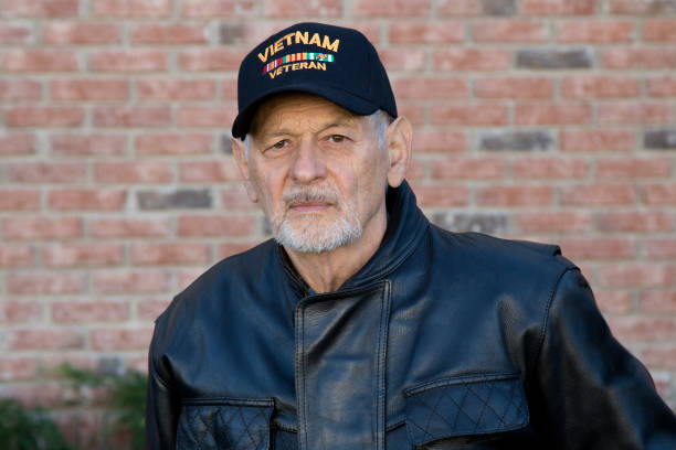 istock Vietnam Veteran outdoors looking toward camera 1288652274