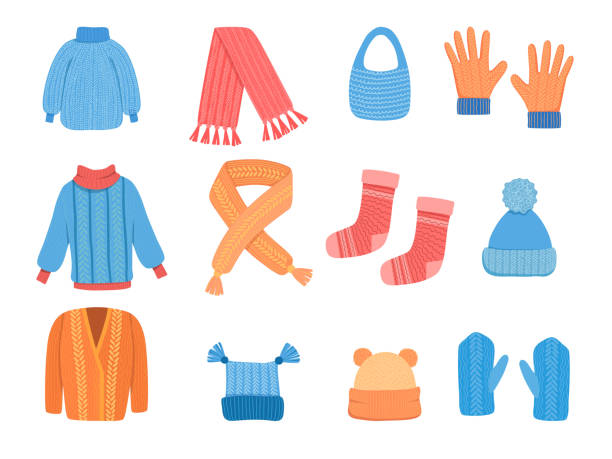 Knitting clothes. Winter cup cardigan jacket scarf woolen coat vector colored stylish clothes vector collection Knitting clothes. Winter cup cardigan jacket scarf woolen coat vector colored stylish clothes vector collection. Illustration winter mittens, seasonal clothing accessories cardigan sweater stock illustrations