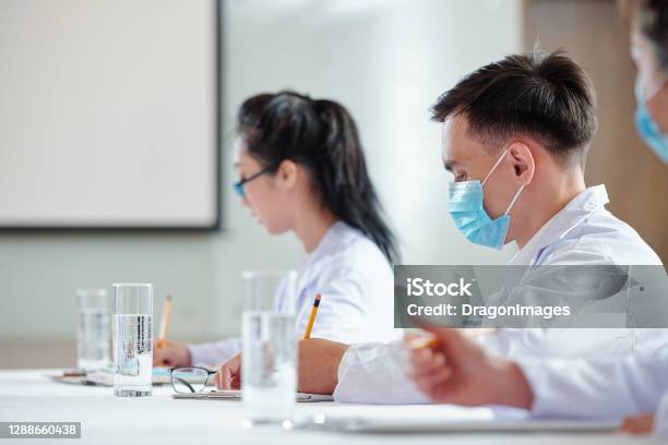 Young Doctors Attending Lecture Stock Photo - Download Image Now - Medical Student, Student, Pandemic - Illness