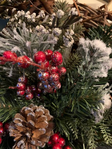 istock Classic Berries on Snowy Wreath 1288661190