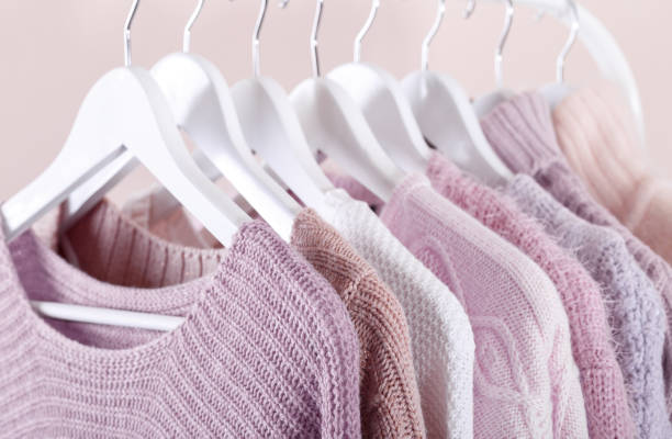 istock Autumn, winter clothes hanging on a rack 1288661382