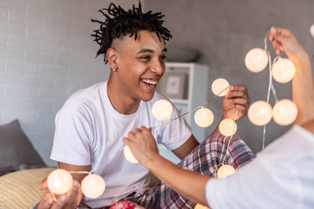 istock Young couple in bed, celebrating Christmas 1288662958