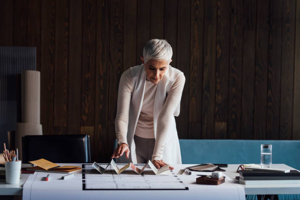 istock Experienced Female Designer Working on a Project in her Home Studio 1288664646