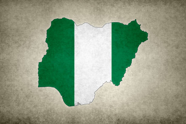 Grunge map of Nigeria with its flag printed within its border on an old paper.