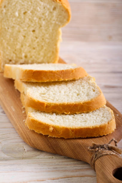 istock Homemade white loaf of bread sliced 1288666228