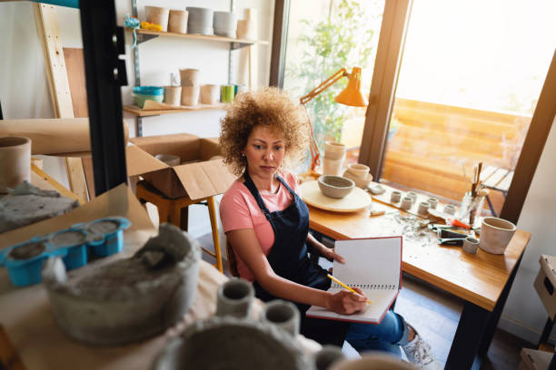 istock Woman artisan working in a small business workshop 1288667006