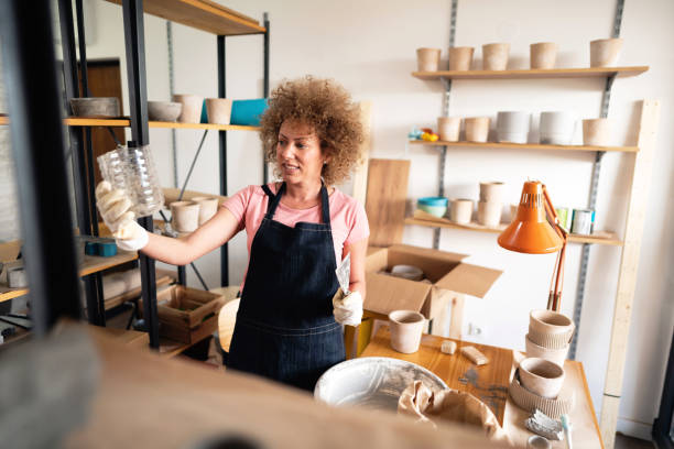 istock Caucasian ethnicity craftswoman working in her creative small business studio 1288667042