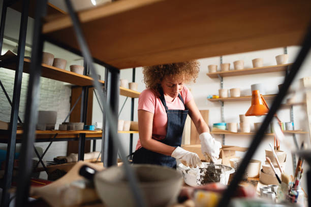 istock Woman entrepreneur at work in her pottery studio 1288667056