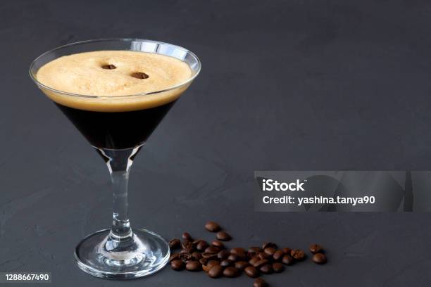 Espresso Martini Cocktail Garnished With Coffee Beans On Dark Table Martini Glass On A Black Background Alcohol Drinks Copy Space Top View Stock Photo - Download Image Now
