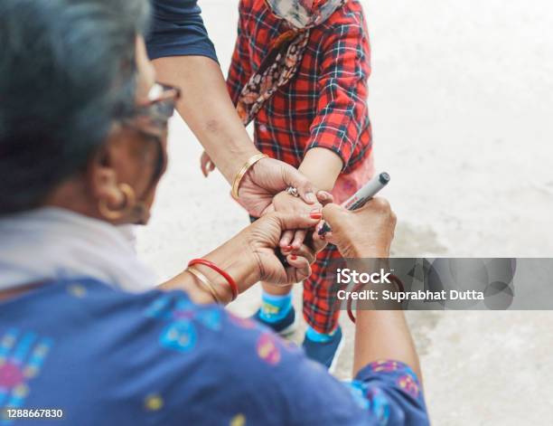 Pulse Polio Vaccination Programme In West Bengal Stock Photo - Download Image Now - Adult, Black Color, Blue