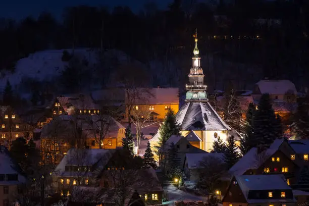 Illuminated Church in Seiffen at Christmastime. Saxony Germany
