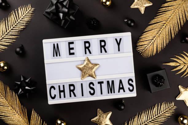 istock Merry Christmas lettering on lightbox.Festive composition 1288672607