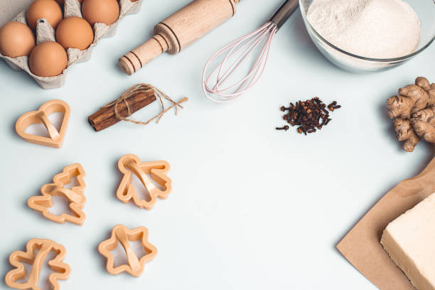 istock Shortcrust pastry for gingerbread.Christmas background for baking, top down view, copy space. Christmas and New Years, family celebration traditions. cinnamon, spices, flour on a white table. 1288674002