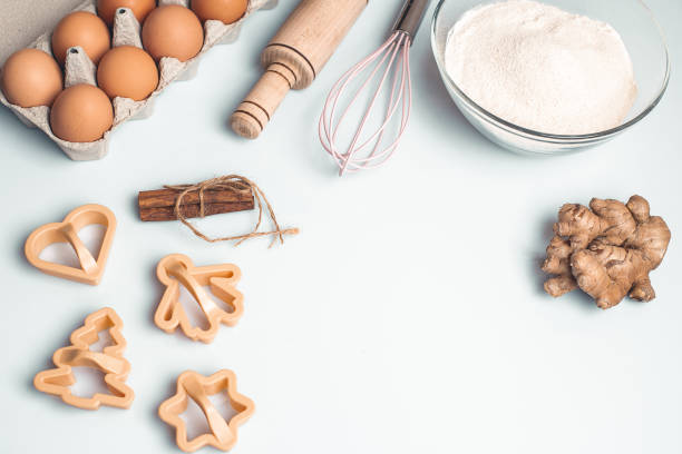 istock Shortcrust pastry for gingerbread.Christmas background for baking, top down view, copy space. Christmas and New Years, family celebration traditions. cinnamon, spices, flour on a white table. 1288674018