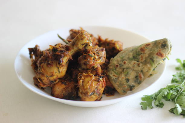 istock dry chicken roast served with methi paratha 1288675919