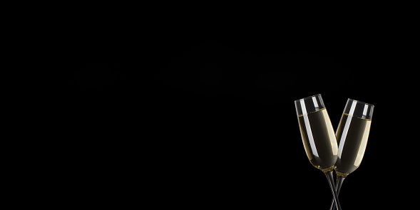 Christmas background, glasses with champagne on a black background. New year concept, idea, texture for design