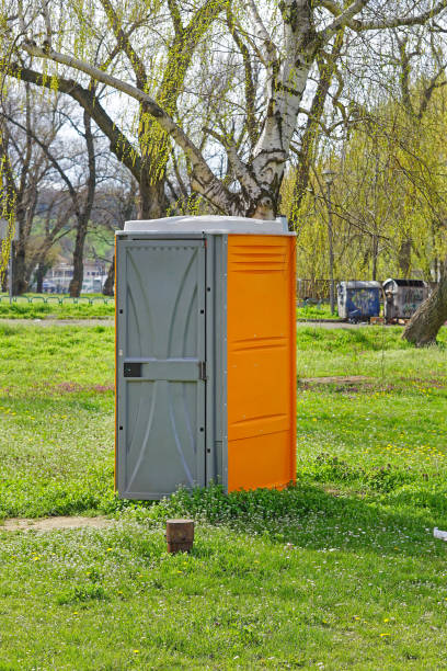 istock Porta potty field 1288678786