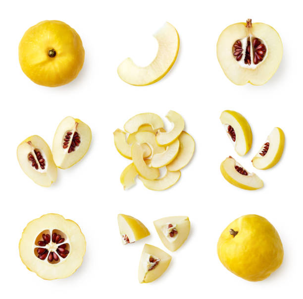 Set of fresh whole and sliced quinces Set of fresh whole and sliced quinces isolated on white background, top view cydonia stock pictures, royalty-free photos & images