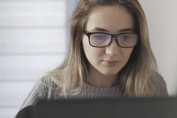istock young beautiful woman with laptop 1288682982