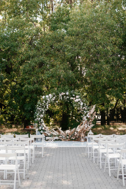 istock wedding ceremony area, arch chairs decor 1288683667