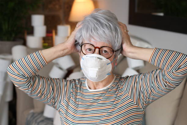 istock Senior woman taking measures during pandemic 1288685123