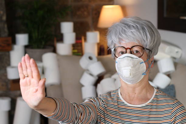 istock Senior woman taking measures during pandemic 1288685156